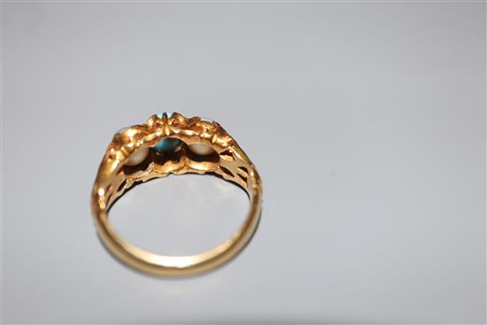 A Victorian style yellow metal turquoise and cultured pearl three stone ring, size H, gross 4.7 grams.